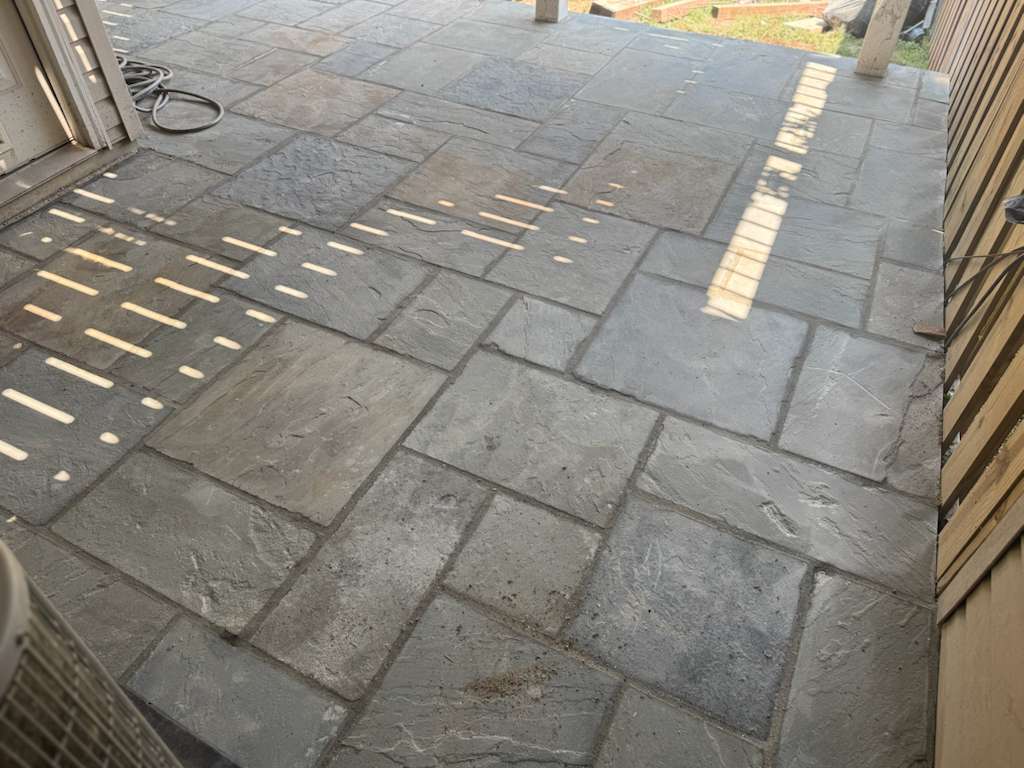 Natural Bluestone vs Concrete Pavers for Patios