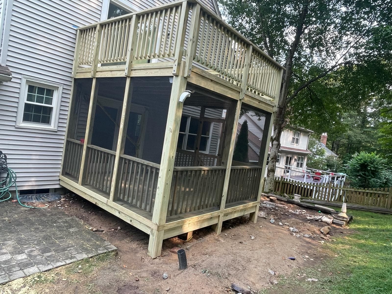 Comparison of deck materials — composite, wood, and PVC decking samples in Northern Virginia