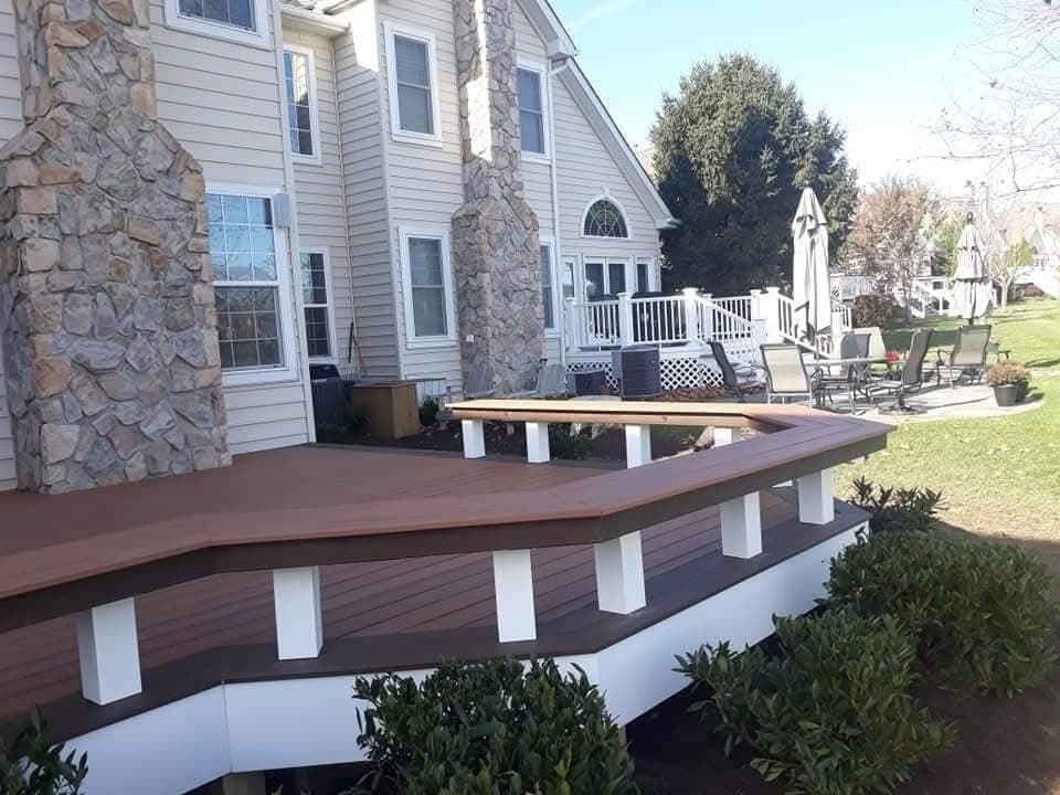 Custom composite deck installation in Northern Virginia with integrated seating